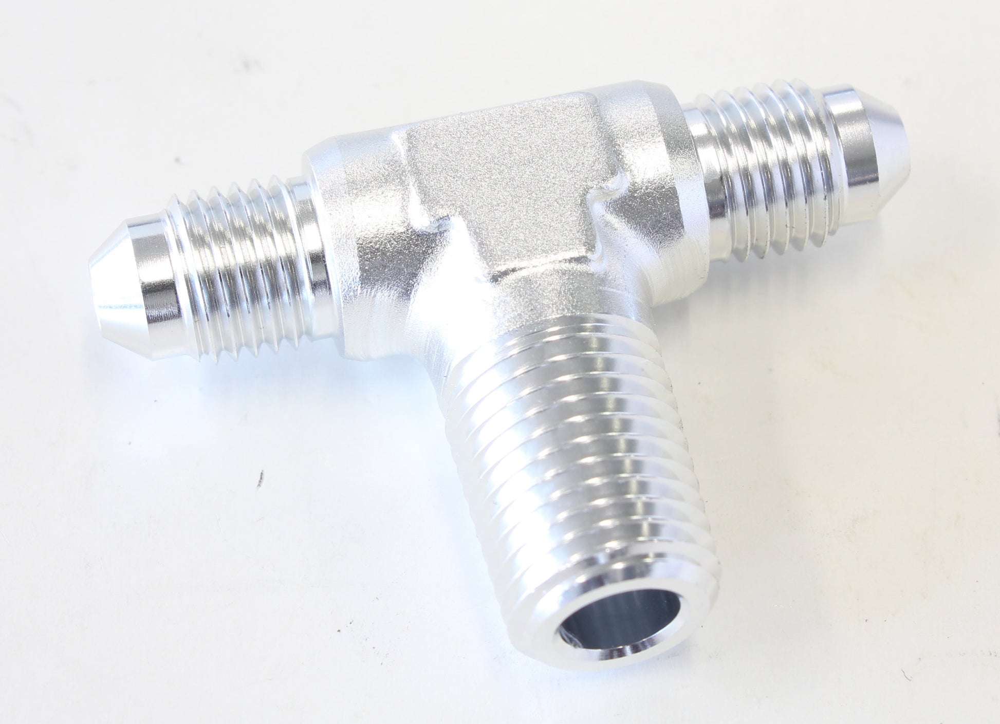 TEE -4AN WITH 1/4" NPT ON SIDESILVER AN TEE WITH NPT ON SIDE
