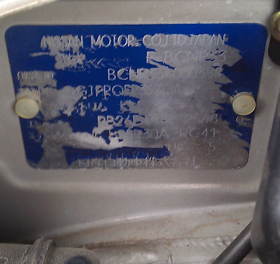 NISSAN BLUE VIN TAG